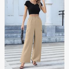 Trendy Beige Cargo Pants. High-Waisted With Wide Legs. Features Side Pockets. Beige High Waist Summer Cargo Pants, High Waist Beige Cargo Pants For Summer, High-waist Beige Cargo Pants For Summer, Beige High Waist Non-stretch Cargo Pants, High Waist Non-stretch Beige Cargo Pants, Spring Khaki High-waisted Work Pants, Beige Trousers For Summer Work, Beige Summer Work Trousers, Beige Full Length Cargo Pants For Summer