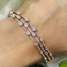 Cute 5.75ct diamond tennis bracelet with diamonds, with round and pear shape G color and VS2- SI1 Clarity set in 14kt Rose Gold in Prong Setting. Carat Range 5.75 Color G Clarity VS2-SI1 Cut Pear, Round GemStone Diamond - April Material 14k Rose Gold Shop Bracelet, Diamond, Tennis Bracelets Pear-shaped Fine Jewelry Tennis Bracelet For Anniversary, Pear-shaped Diamond Bracelet For Anniversary, Fine Jewelry Diamond Pear-shaped Tennis Bracelet, Diamond Bracelets Wedding, Diamond Bezel Bracelet, Gold Tennis Bracelet, Bracelet With Diamonds, Diamond Bracelet Design, Latest Bracelets