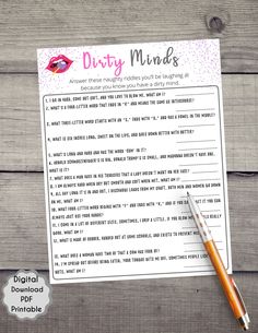 a printable dirty minds game with a pen next to it on a wooden table