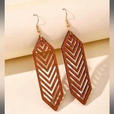 These Chevron Dangles Are Made From Lightweight Wood And Feature A Chevron Design. These Stylish Dangles Are Versatile Enough To Pair With Any Look. Perfect For Casual Wear Or Dressy Occasions. 9.2cm X 2cm Wood Dangle Earrings, Color Cafe, Watches Women Fashion, Wooden Earrings, Hexagon Shape, Wood Earrings, Girls Earrings, Boutique Jewelry, Accessories Bracelets