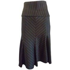 This a-line skirt with godet bottom, has a chevron and stripe pattern. What sets it apart from a regular skirt is the addition of the cummerbund. Your choice, on or off! The skirt is lined with the Missoni chevron pattern. Classic Fitted A-line Bottoms, Classic Fitted A-line Skirt, Fitted A-line Skirt For Workwear, Chic Fitted Bottoms With Striped Hem, Elegant Fitted Striped Bottoms, Elegant Striped Fitted Bottoms, Chic Fitted Skirt With Striped Hem, Elegant Striped Relaxed Skirt, Classic Fitted Flared Skirt