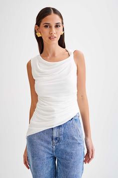 Tie it up. The PRIANYKA Slinky Sleeveless Top has been designed to elevate any look. The draped scoop neckline and the open back has been designed to frame your form, while the tie detail allows you to adjust the fit to your preference. Pair with the Roxy Denim Jeans for a complete look. Scoop Neck Tank Top, Style Upgrade, Women's Fashion Dresses, Scoop Neckline, Roxy, Latest Fashion Trends, Open Back, Latest Fashion, Denim Jeans