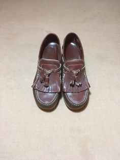 "1970s women's loafers brand- Dex brown leather upper kiltie w/tassel moc toe rubber sole slight raised back white stitching 360 degree laces (functional) good vintage condition, light wear label size 7, see below measures, lying flat, insole-9 1/4\" sole-9 3/4\" width-3 1/4\" heel-2 1/4\" total height-4 1/2\"" Brown Tassel Loafers With Leather Footbed, Brown Tassel Loafers With Brogue Detailing, Leather Tassel Loafers With Round Toe, Vintage Fall Loafers With Brogue Detailing, Fall Vintage Loafers With Brogue Detailing, Retro Leather Sole Loafers With Round Toe, Retro Brown Loafers With Round Toe, Retro Brown Round Toe Loafers, Brown Tassel Loafers With Rubber Sole For Fall