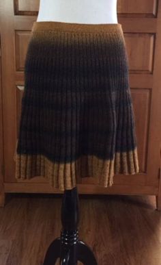 Hand-knit, ribbed skirt.  28" elastic waist. 18.5" long.  Hand wash only. Ribbed Skirt, Womens Skirts, Widget Icon, Long Skirts, Knit Skirt, Hand Knitting, Elastic Waist, Womens Skirt, Hand Wash