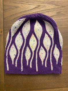 Cute hat with leaf pattern. Hat in picture is shown in purple and funfetti. Made with pattern bought from Wooly Wormheads. Link below.  https://www.etsy.com/search?q=wooly%20wormhead&ref=auto-1 Warm Purple Beanie Cap, Purple Beanie Cap, Winter Purple Knitted Hat, Purple Knitted Beanie Hat, Purple Winter Hat With Curved Brim, Purple Beanie For Fall, Hand-knitted One Size Purple Hat, Hand Knitted Purple Hat One Size, Hand Knitted One Size Purple Hats