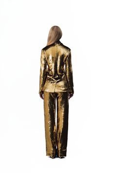 Goldie Sequin Pants Key Features: Reversible gold and silver sequins Mid-rise with a straight, floor-length fit Gold buttons, zipper, and side pockets Hook clasp for a secure closure Made in the USA Details: The Goldie Sequin Pants feature a mid-rise, straight fit, and floor-length design. Made with gold and silver sequins, they include gold buttons, a zipper, and side pockets for added functionality. This stunning look is the perfect show stopper for any event. Content + Care: Dry Clean Only.Si Luxury Sequined Bottoms For Formal Occasions, Gold Sequined Evening Pants, Luxury Sequined Evening Pants, Luxury Sequined Bottoms, Luxury Sequined Pants For Evening, Luxury Sequin Pants For Evening Wear, Fitted Sequin Luxury Pants, Luxury Party Pants, Gold Sequined Party Pants