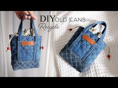 a handbag made out of old jeans is being held by someone's hand