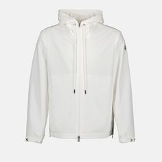 • Round collar
 • Long sleeves
 • Straight cut
 • Double slider zip closure
 • Moncler logo in felt on the sleeve
 • Elastic edges
 • Fixed, adjustable hood with drawstring
 • Slit side pockets
 • Solid color
 • Made of nylon
 • Several colors available Moncler Logo, Luxury Outerwear, Moncler Jacket, Polo Jeans, Fashion Deals, Jacket For Men, White Jacket, Dress Trousers, T-shirt Polos