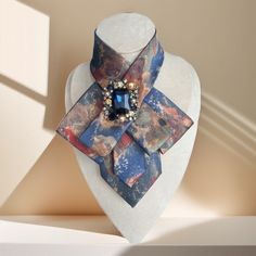 Elevate your look with this stylish Blue Bow Tie for Women! This chic pattern necktie necklace is a versatile accessory that adds a touch of elegance to any outfit. Whether you're dressing up for a special occasion or adding a unique flair to your everyday look, this tie for women is the perfect choice. This trendy accessory also makes a thoughtful and unique gift idea for Mom or a fashion-forward friend. Make a statement with this stylish and versatile bow tie necklace! Product name: Tie for wo Elegant Adjustable Neckwear For Gifts, Elegant Adjustable Neckwear As Gift, Elegant Adjustable Neckwear As A Gift, Chic Formal Jewelry With Ribbon, Chic Ties As A Gift, Chic Neckwear Ties As Gift, Elegant Adjustable Jewelry For Office, Business Women Office, Women Office Wear