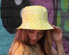 Red Bucket Hat, Women's Hat, Boho Chic Hat, Music Festival Hat, Boho Style, Crushable Washable Beach Hat, Reversible Hat, Fishing HatReversible Paisley print Bucket hat. Sewn from a poly/cotton mix.One size fits up to 23" head circumference.For more styles, please check:http://www.etsy.com/shop/katarinacouture?ref=si_shopTo measure your head: Place a measuring tape on your forehead just above eyebrow level and pass it around your head, ensuring that the widest part of the head is included. Commo Boho Chic Hats, Mens Summer Hats, Red Bucket Hat, Chic Hat, Boat Hat, Black Bucket Hat, Summer Hats For Women, Festival Hat, Fall Denim