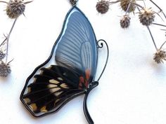 It is handcrafted exclusive design pendant made with glass and real butterfly wings. Each of our pendants can not be repeated exactly. The pendant can be worn on both sides. It will be nice anniversary gift. All jewelry comes in a cardboard box ready to be gift wrapped. And other unique jewelry here https://www.etsy.com/shop/RosavaGlassStore We accept only PayPal. Item is ready to ship, we will send it within 1-3 bussines days after payment confirmation. We do not ship on Saturdays and Sundays. Handmade Unique Butterfly Necklace, Handmade Unique Butterfly Shaped Necklace, Black Butterfly-shaped Jewelry For Gift, Black Butterfly Jewelry For Gift, Wing-shaped Black Jewelry Gift, Black Wing-shaped Jewelry Gift, Wing-shaped Black Jewelry For Gifts, Black Wing-shaped Jewelry For Gifts, Gift Black Jewelry With Wing-shaped Pendant