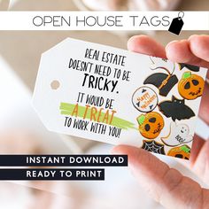 an open house tag is being held up in front of a white background with the text, instant printable halloween tags