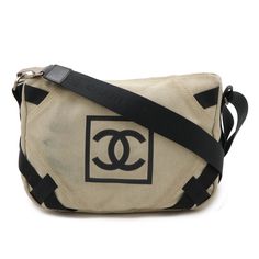 Used Chanel Chanel Sport Line Coco Mark Shoulder Bag Canvas Beige Black (Sku: Gzl14ve7) === General === Brand : Chanel Line : Sport === Design === Type : Shoulder Bag Material : Canvas Color : Beige, Black Outer Pocket : Zipper Pocket Gender : Women === Size === Size (Hxwxd) : 22.5cm X 29cm X 12cm / 8.85'' X 11.41'' X 4.72'' Strap Length : 130cm / 51.18'' === Included Items === Accessories : Box Accessories Notice : Before Purchasing, Please Refer To The Images Of The Accessories Included With T Chanel Sport, Sport Design, Chanel Chanel, Canvas Messenger Bag, Box Accessories, Stylish Shoulder Bag, Accessories Box, Bag Canvas, Sport Bag