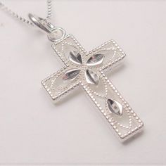 Sterling Silver Holy Cross Decorative Silhouette Pendant Necklace This Beautiful Holy Cross Decorative Silhouette Sterling Silver Necklace Comes With A .925 Sterling Silver 20 Inch Chain And The Holy Cross .925 Sterling Silver Pendant. The Pendant Measures 1 Inch High And 5/8 Inches Wide. The Chain Measures 20 Inches And Weighs 2.2g. Cn 1-0295 Nautical Jewelry, Holy Cross, Cross Jewelry, Fine Jewellery Necklace, Selling On Ebay, Sterling Silver Necklace, Sterling Silver Pendant, Sterling Silver Necklaces, Sterling Silver Pendants