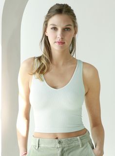 Ribbed knit crop top featuring a v-neckline and cropped silhouette. FABRIC: 92% Nylon / 8% Spandex ONE SIZE Made in USA Ribbed Crop Top, Neck Crop Top, Knit Crop Top, Knit Crop, Feminine Look, Sweater Blouse, Headband Hairstyles, Dress Romper, Cropped Tank Top