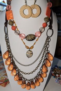 These are very beautiful sets of jewelry ( necklaces, earrings and bracelets),they can be worn together or separately.There are a total of 8 pieces in this lot. They are made up of stones and beads very good vintage condition.They are clear,browns, and orange colors. They all come together in shades and make a great conversation starter.Dont miss out on the opportunity to o own these for yourself! Brown Multi-strand Party Jewelry, Multi-strand Czech Glass Colorful Beads Jewelry, Colorful Multi-strand Czech Glass Beaded Jewelry, Orange Dangle Jewelry With Colorful Beads, Brown Multi-strand Jewelry For Party, Glass Dangle Jewelry For Parties, Party Glass Dangle Jewelry, Colorful Beaded Glass Jewelry For Party, Colorful Glass Beads Jewelry For Party