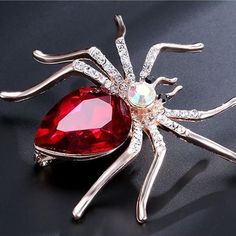 New! Large Spider Crystal Brooch Pin With Rhinestone Accents. Red Crystal Stone Body. Approx 2.19" X 2.09". New To Poshmark? Save $10 On Your First Purchase When You Sign Up For An Account With The Invite Code: Freshfit Style Tags# Lapel Jacket Bag Pin, Hat Pin, Sparkly Shiny Halloween Costume Cosplay Accent Accessory Cheryl Blossom Riverdale Umbrella Academy The Handler Widowmaker Goth Gothic Punk Big Red Brooch Pins For Valentine's Day, Red Brooches For Valentine's Day, Red Brooch For Valentine's Day Party, Red Rhinestone Brooch For Gift, Red Rhinestone Brooches For Gifts, Red Brooch Jewelry For Valentine's Day, Red Valentine's Day Brooch, Valentine's Day Party Brooch Jewelry, Women Brooch