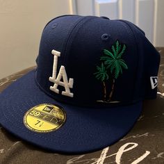 100% Authentic, Brand New Never Worn, Tags Attached, Retails For Over 50, La Dodger Blue Hat With The Palm Trees On The Front, Size 7 1/8 , Make An Offer Blue Embroidered Snapback Fitted Hat, Blue Baseball Cap With Embroidered Logo And Flat Bill, Blue Baseball Cap With Embroidered Logo, Blue Hats With Embroidered Logo And Curved Brim, Blue Fitted Hat With Embroidered Logo And Curved Brim, Blue Fitted Hat With Embroidered Logo For Baseball Season, Blue Trucker Hat With Embroidered Logo And Flat Bill, Blue Flat Bill Hat With Embroidered Logo, Blue Hat With Embroidered Logo