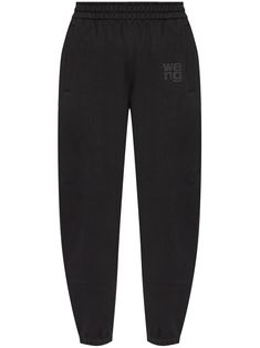 black cotton jersey texture elasticated waistband appliqué logo slip pockets to the sides tapered leg elasticated cuffs Black Relaxed Fit Bottoms With Logo Print, Sporty Relaxed Fit Sweatpants With Logo Waistband, Sporty Loungewear Bottoms With Logo Waistband, Black Cotton Pants With Logo Print, Relaxed Fit Logo Waistband Joggers For Loungewear, Cotton Joggers With Logo Waistband For Jogging, Cotton Athleisure Sweatpants With Logo Waistband, Athleisure Sweatpants With Logo Waistband For Jogging, Sporty Streetwear Bottoms With Logo Detail