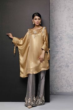 SKU: 408 Price for Shirt & Trouser 2pc Gold pure shimmer fabric with all hand embrodiery. Pants have detailed handwk of pearls tilla and cutdana and with threadball work. Pakistani Designer Dress, Greek Goddess Style, Pakistani Designer Clothes, Shimmer Fabric, Shirt Trouser, Simple Pakistani Dresses, Inner Goddess, Colour Combo, Pakistani Dress Design