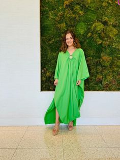 Marley kaftan in green with a hoop detail in the center Green Maxi Length Kaftan For Spring, Elegant Green Kaftan For Vacation, Green V-neck Kaftan For Spring, Green Long Sleeve Kaftan For Spring, Chic Green Summer Kaftan, Green Long Sleeve Kaftan For Vacation, Long Sleeve Green Kaftan For Vacation, Oversized Green V-neck Dress, Elegant Green Spring Kaftan