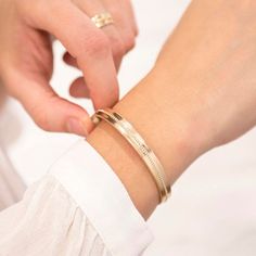 Our Personalized Single Beaded Open Bangle is elegant and adds a touch of sophistication to any outfit.Available in 18K Gold Plated; engrave up to 40 characters on the inside of the bangle to keep your personalization secret. >>>>>>>>>>>>HOW TO PERSONALISE THIS ITEM<<<<<<<<<<<>>>>>>>>>>>>>>>>>>> DIMENSIONS<<<<<<<<<<<<<<<<&lt Single Bead, Open Bangle, Stacked Bangles, Gift For Mum, Elegant Bracelet, Gold Bangle, Classic Gold, Hand Engraving, Gold Bangles