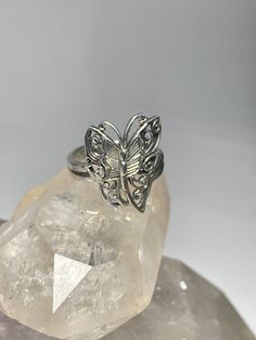 "Butterfly Ring Butterflies Band sterling silver women Size 6.75 Weight 5.4g Length. 7/8\" Width. 1/2\" Thinnest part of band 1/8\" Free Shipping & Free Postal Insurance Delivered in a Gift Box If you do not want the ring polished and want to leave the natural patina please let me know at the time of purchase as I do polish rings before I ship rings out. Thanks Free First Class shipping and postal insurance is included. If you want to upgrade to priority kindly pay an additional fee to do so Eye Band, Poison Ring, Butterfly Ring, Star Butterfly, Moonstone Ring, Silver Band, Beautiful Rings, Class Ring, Silver Fashion