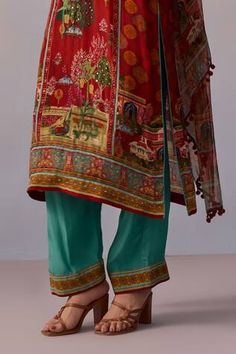 Red panelled kurta with printed scenic mughal motifs, embellished by beads and front tie. Comes with pant and dupatta. - Aza Fashions Red Unstitched Lawn Suit For Transitional Season, Silk Red Lawn Suit With Printed Motifs, Red Lawn Suit With Dabka Work For Transitional Season, Bollywood Style Red Lawn Suit With Printed Motifs, Red Silk Lawn Suit With Traditional Drape, Red Salwar Kameez With Printed Motifs For Transitional Season, Designer Red Lawn Suit With Printed Motifs, Bollywood Unstitched Red Suit With Printed Motifs, Red Silk Lawn Suit With Printed Motifs