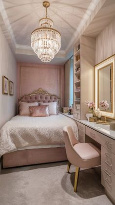 a bedroom with a pink bed and chandelier