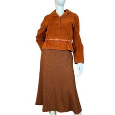 Beautifully Stunning 70's Vintage Burnt Orange Suede Jacket And Matching Wool Skirt Set By Anne Klein. Jacket Features Six Snap Button Closures, Matching 37" Belt, Low Elastic Waist, And Satin Lining. Skirt Is Noted As 100% Wool And Features A Shetland Weave With Black, Brown, And Orange, A 7.5" Side Zipper Closure, And Silk Chiffon Lining. Both Pieces Are Noted As Size 10. The Only Blemish Noted Is There Is Some Wear On The First Belt Hole, Please See Photos For Reference. Overall, This Set Is In Great Condition, It's Quite A Collector's Piece! All Measurements Are Taken Flat. Please Let Me Know If You Have Any Questions. Jacket- Bust: 19.5" Waist: 14.5" - 17" Sleeve Length: 29" Overall Le Brown Skirt Suit For Fall, Vintage Fitted Skirt Suit For Fall, Fall Brown Long-sleeved Skirt Suit, Fall Long Sleeve Brown Skirt Suit, Fall Brown Long Sleeve Skirt Suit, Brown Long Sleeve Skirt Suit For Fall, Vintage Orange Outerwear For Workwear, Vintage Fall Skirt Suit For Workwear, Retro Fall Skirt Suit For Formal Occasions