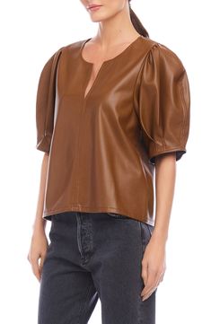 Soft faux leather brings edge to your look in a contemporary top fashioned with elbow-length puff sleeves. 23" length (size Small) Split neck Elbow-length sleeves 100% polyurethane Hand wash, line dry Made in the USA of imported fabric Leather Blouse, Puff Sleeve Top, Elbow Length Sleeve, Puff Sleeves, The Twenties, Puff Sleeve, Caramel, Top Styles, Sleeve Top