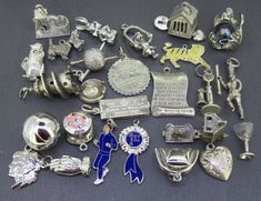 Choice of vintage sterling silver (previously worn) charm for charm bracelets. A variety of sizes and conditions so please view photos and ask any questions if needed though they all have age related wear and/or patina (rarely are they in perfection condition), pictures tell the best story. They are all either marked or tested and guaranteed sterling silver if unmarked. Anything not sterling will be noted. Anything not pictured with a jump ring will have one included in their order. Great variety here! Options are: Water Pump Movable Bunny Rabbit (head moves) Girl Mouse "Jail" with Dangling Hearts (never seen one like this before) Angel with Glass Orb (Has a little piece of something iridescent in the orb) Movable Scholarly Owl (moving the "arms" makes the eyes pop in and out) Movable Terr Personalized Silver Charm Bracelet For Gift Making, Vintage Silver Jewelry For Gift Making, Collectible Silver Engraved Charms, Silver Engraved Charms For Collectors, Antique Nickel-free Collectible Charms, Collectible Silver Vintage Charm, Vintage Silver Charms For Gifts, Vintage Silver Charms For Gift, Vintage Pendant Charms For Anniversary