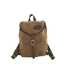 a brown canvas backpack with leather straps