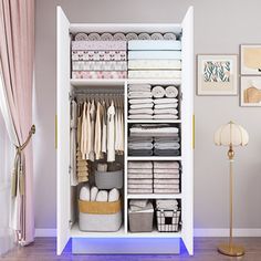 an organized closet with linens, towels and other items