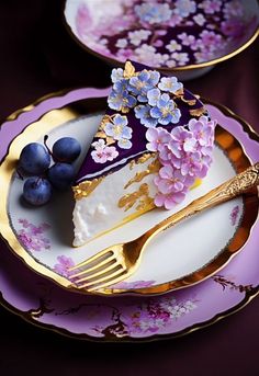 there is a piece of cake on the plate with purple flowers and gold trimmings