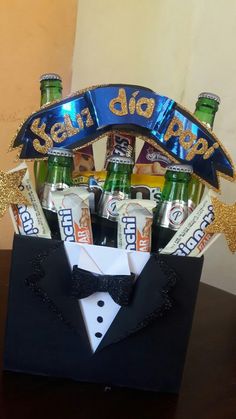 a man's suit and bow tie with beer bottles in it