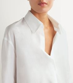 Find VINCE Cotton Half-placket Shirt on Editorialist. This shirt from Vince's latest collection offers a more laid-back finish with a half-placket neckline, foregoing buttons for a more open finish. Tuck the crisp cotton style into the waistband of any tailored trousers for a chic ensemble. Elegant V-neck Shirt For Daywear, Sleek Tops With Lapel Collar For Workwear, Modern Workwear Tops With Concealed Placket, Modern Tops With Concealed Placket For Workwear, Modern Tops For Workwear With Concealed Placket, Sleek Lapel Collar Tops For Office, Timeless Formal Tops With Relaxed Fit, Workwear Tops With Concealed Placket And Spread Collar, Workwear Top With Concealed Placket And Spread Collar