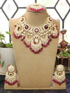 A Kundan Meena Polki bridal jewelry set can make a beautiful gift for occasions like weddings, anniversaries, birthdays, Mother's Day, and more. It's a thoughtful present for your wife, sister, or anyone celebrating a special event. The intricate craftsmanship and traditional design of Kundan Meena Polki jewelry make it a timeless and elegant choice. Whether it's for a Punjabi wedding or any other celebration, it's sure to be cherished.https://jewellerybypooja.etsy.com Heavy Jewellery, Bridal Jewels, Bridal Choker, Gold Bridal Jewellery Sets, Polki Jewellery, Punjabi Wedding, Sister Wife, Jewellery Sets, Gold Necklace Set