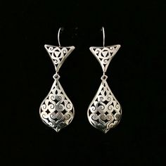 These are such GORGEOUS earrings!!  I love this Mexican "cut out" design and these are THE BEST I have seen. I had my silversmith convert them from screwbacks to safety wires. They are stunning on!  Very light and comfortable.  These beauties measure 2 1/2" x 1". They are in wonderful condition. Hallmarks on the back of each as seen in the last photo. So beautiful!! ALL SALES FINAL so please let me know if you have any questions. Sorry, no exceptions. Thanks! Vintage Sterling Silver Drop Plug Earrings, Vintage Sterling Silver Earrings With Intricate Design, Vintage Sterling Silver Drop Earrings, Silver Art Deco Pierced Earrings, Vintage Teardrop Pierced Plug Earrings, Vintage Sterling Silver Pierced Plug Earrings, Vintage Sterling Silver Plug Earrings, Vintage Teardrop Plug Earrings, Art Deco Sterling Silver Drop Earrings