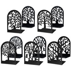 six black metal tree bookends are shown in the shape of bookshelves