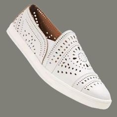 American Rag Casual Round Toe Slip-On Sneakers In White With White Rim. Perforated Pattern On Top And Sides For Breathable All Day Wear. Elastic Bands At Sides For Ease To Slip-On And A Secure Fit. Brand New With Box - Never Worn. Woman's Size 8m. White Synthetic Slip-ons With Perforated Toe Box, White Leather Flat Slip-on Sneakers, White Flat Heel Slip-on Sneakers, White Slip-ons With Perforated Toe Box, Comfortable White Flat Heel Slip-on Sneakers, Comfortable White Slip-on Sneakers With Flat Heel, Casual White Slip-ons With Perforated Toe Box, White Perforated Round Toe Slip-ons, Slip-on Sneakers With Perforated Toe Box