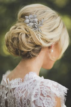 a woman wearing a bridal hair comb