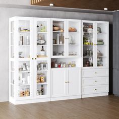 a large white cabinet filled with lots of different types of food and drinks on top of wooden floors