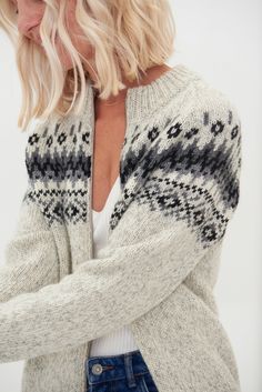 "Time-resistant, adapted for those who value functionality and classics. Sustainable norwegian wool jumper is the perfect solution for people who are always feeling cold. Light melange colour sweater comes in a regular fit, has a full front zip. Knitted cosy top features minimalist ornaments inspired by Scandinavian style. Handmade and designed in my Wool House studio, North Europe, Lithuania. +𝑨𝒅𝒅𝒊𝒕𝒊𝒐𝒏𝒂𝒍𝒍𝒚 𝑰 𝒂𝒎 𝒂𝒅𝒅𝒊𝒏𝒈 𝒍𝒊𝒏𝒆𝒏 𝒃𝒂𝒈 𝒇𝒐𝒓 𝒑𝒓𝒐𝒕𝒆𝒄𝒕𝒊𝒏𝒈 𝒕𝒉𝒊𝒔 ? Nordic Style Warm Sweater For Cold Weather, Winter Fair Isle Pattern Outerwear For Cold Weather, Fair Isle Pattern Outerwear For Winter, Winter Fair Isle Pattern Outerwear, Nordic Sweater For Winter, Nordic Winter Sweater For Cold Weather, Nordic Style Knitted Long Sleeve Outerwear, Cozy Winter Outerwear With Fair Isle Pattern, Nordic Style Long Sleeve Winter Outerwear