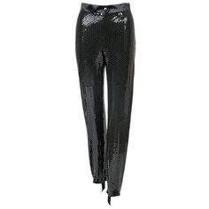 The return of the stirrup pant all over the European runways has put the style back in the spotlight, making this pair designed by Escada in the Eighties an amazing vintage find. Covered in rows and rows of black sequins, the black silk satin trousers have a gorgeous texture and iridescence. The high waistline, slim cut through the hips, looser straight legs and lightweight black stretch nylon lining make for a sophisticated silhouette, which holds its elegant drape with the elasticized strap th High Waisted Loose Pants, 80s Pants, Stirrup Pants, Fitted Pants, Sequin Pants, Satin Trousers, Lightweight Pants, In The Spotlight, Stirrups