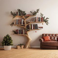 a living room with a couch, book shelf and christmas tree in the corner on the wall