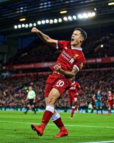 the soccer player is celebrating after his goal