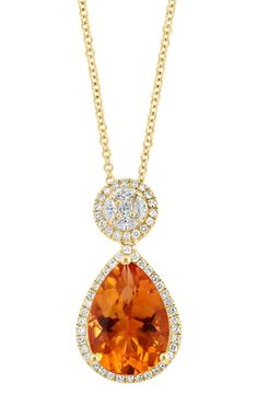 A warm citrine stone pendant, surrounded with glittering diamonds, conjures a firey statement to this delicate 14K gold necklace. 14K gold, diamonds, citrime Total diamond weight: 0.40 ctw 18" length Made in USA Orange Gemstone Necklace, Orange Diamond Necklace, Orange Diamond Accented Jewelry For Weddings, Orange Diamond Jewelry With Diamond Accents, Formal Orange Jewelry With Accent Stones, Yellow Gold Citrine Jewelry With Diamond Accents, Elegant Orange Jewelry With Diamond Accents, Elegant Citrine Necklace With Diamond Accents, Yellow Gold Diamond Necklace With Teardrop Gemstone Pendant