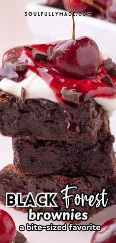 black forest brownies stacked on top of each other with cherries