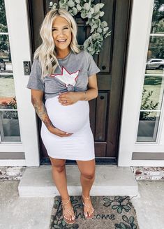 This Sexy Mama Maternity over the belly skirt is the perfect addition to your maternity wardrobe! Pair this skirt with all your favorite crop tops to keep your #coolmom fashion on point!  #SexyMamaMaternity #SexyMama #maternitystyle Summer Stretch Maternity Dress Bump Friendly, Stretch Bump-friendly Maternity Dress, Casual Stretch Maternity Dress, Bump Friendly, Casual Stretch Maternity Dress Bump Friendly, Casual Stretch Maternity Dress With Bump Friendly Design, White Bump-friendly Maternity Dress, White Bump Friendly Maternity Dress, Bump Friendly White Maternity Dress, Cute Maternity